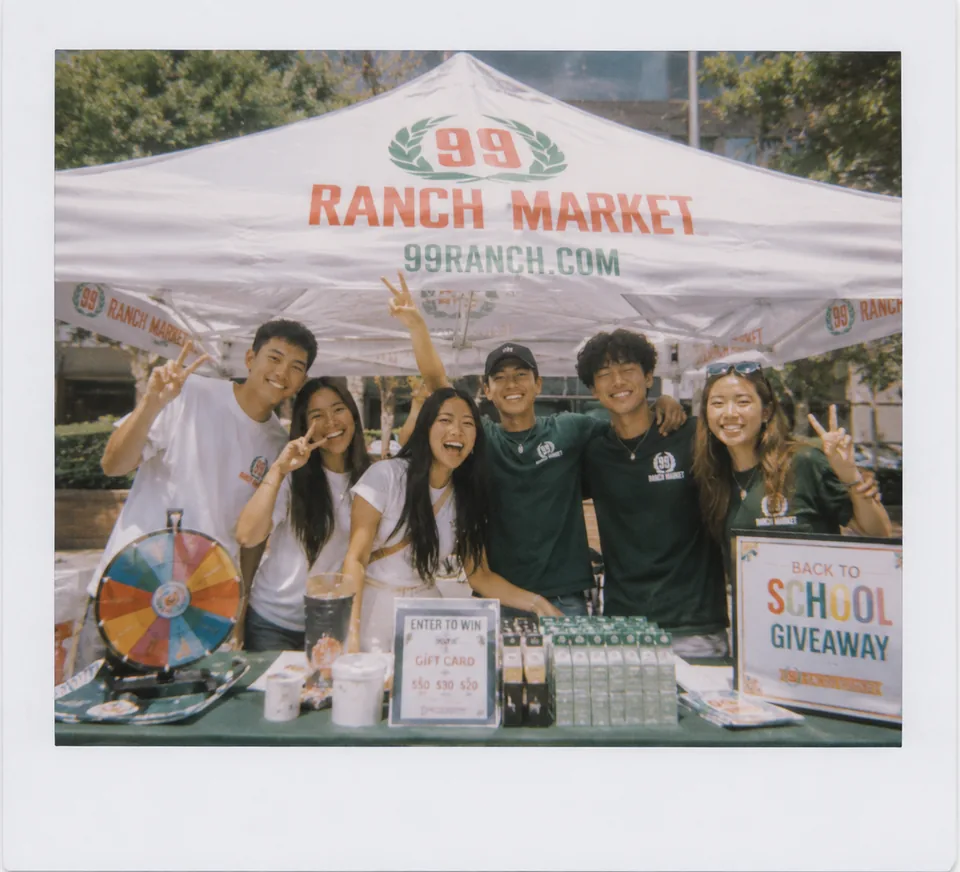 Students at a 99 Ranch Market campus event booth