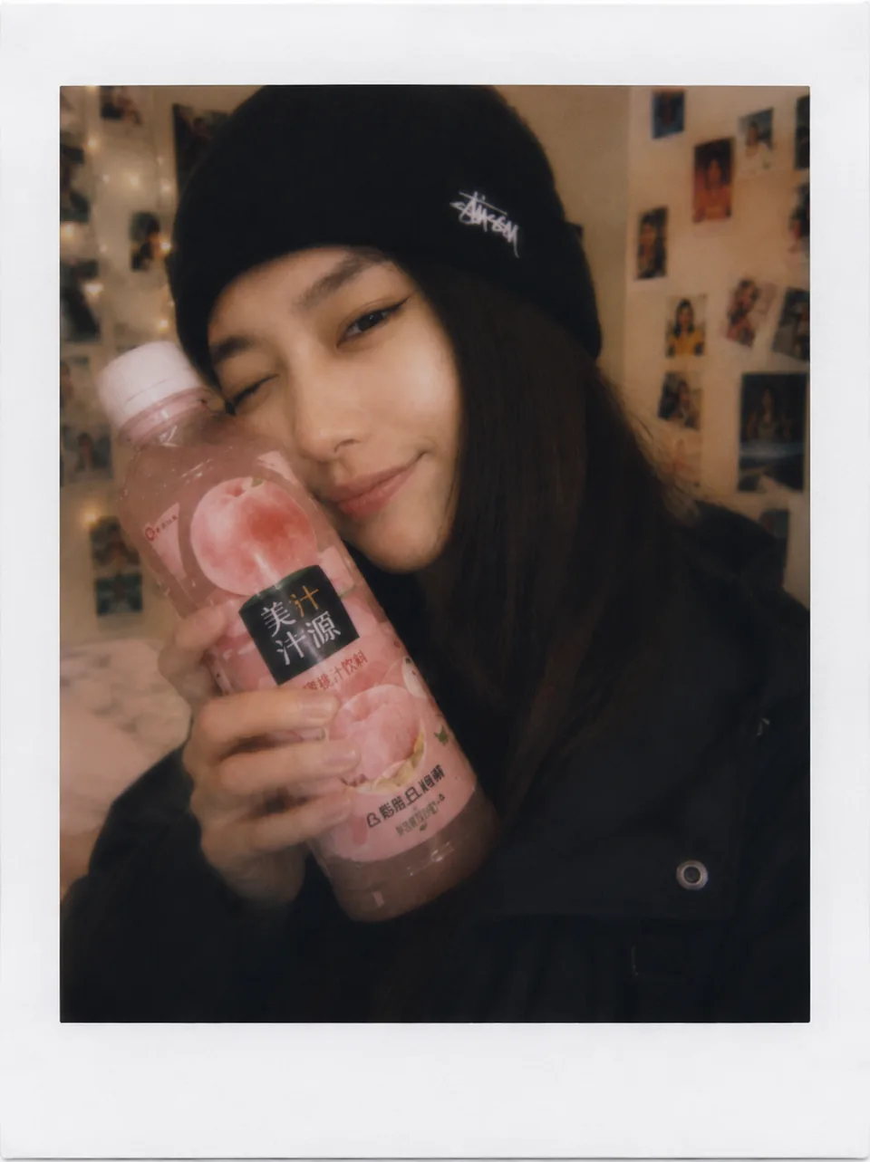 Student holding an Asian drink
